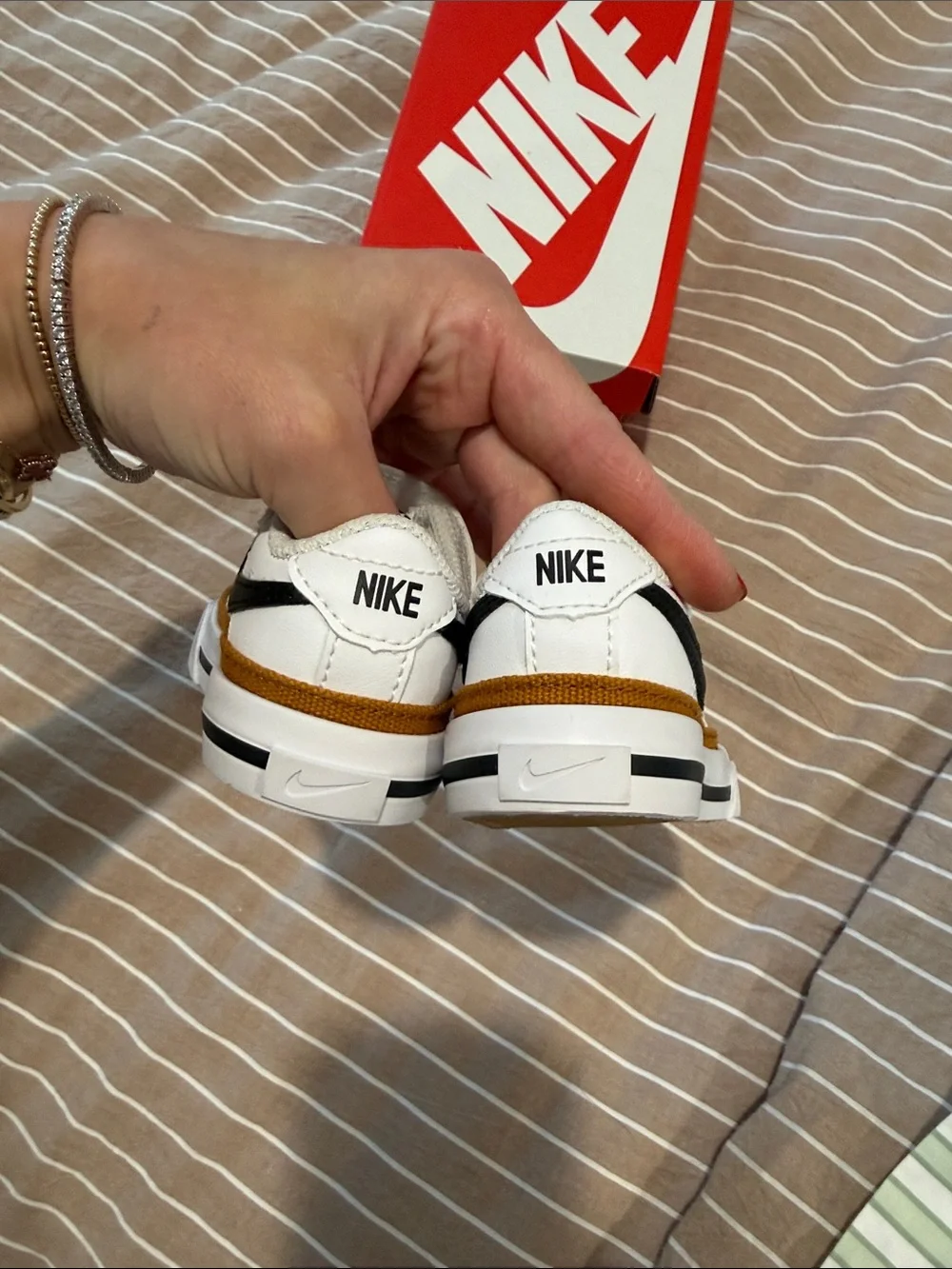 Nike White Kids Sneakers with Brown Accents